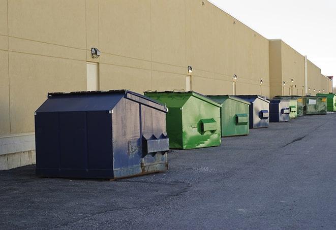 a view of a dumpster truck on a construction site in Albany, GA